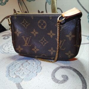 Louis Vuitton Monogram Brown Wristlet